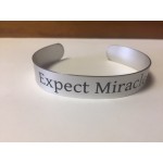 Logo Branded Aluminum cuff bracelet (6.25" x 1/2 wide) with a screen printed imprint. Made in the USA
